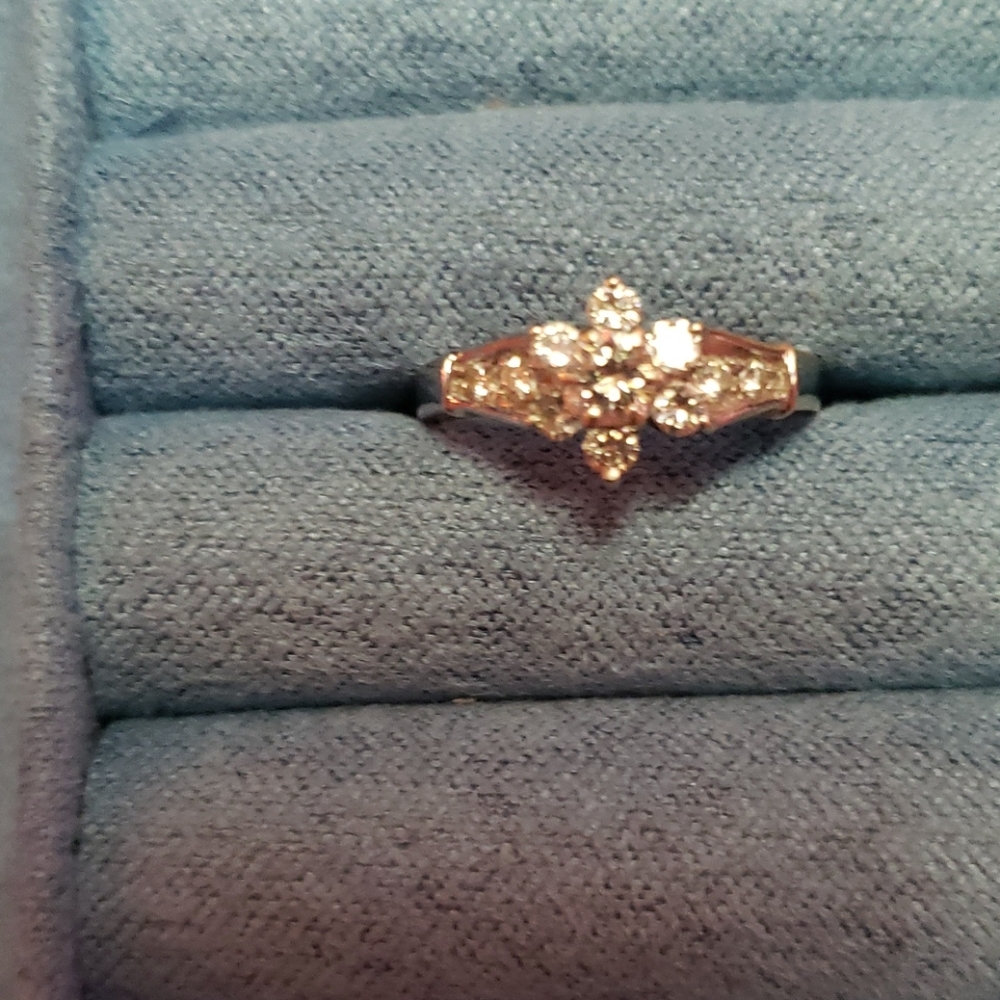 One 18k yellow gold and diamond flower ring.